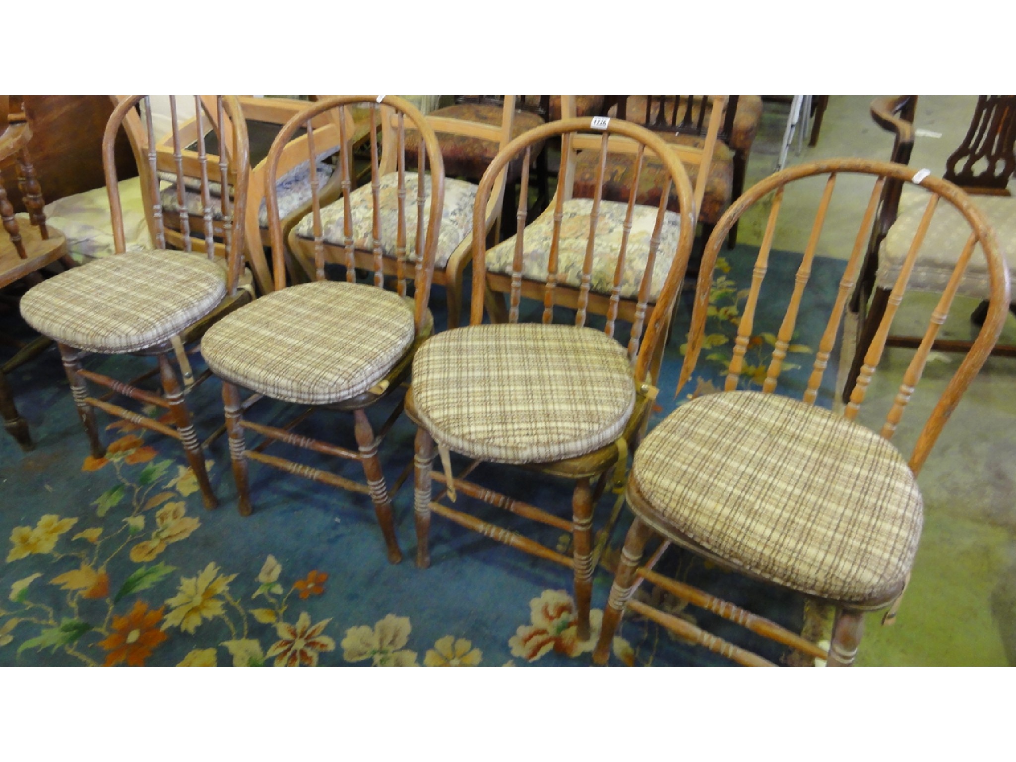 Appraisal: A set of four hoop and stick back dining chairs