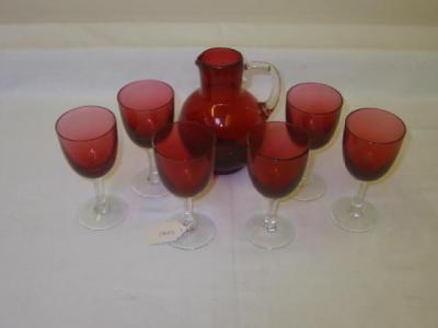 Appraisal: A SET OF SIX CRANBERRY GLASSES the ovoid bowl on