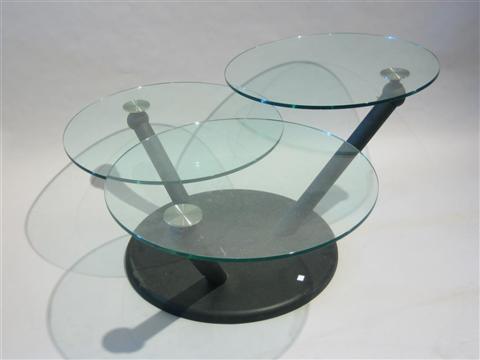 Appraisal: MODERN THREE TIER GLASS COFFEE TABLE Glass panels rotate to