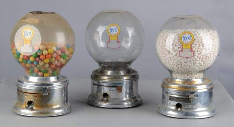 Appraisal: Lot Of Ford Gumball Machines Each features chrome finish body