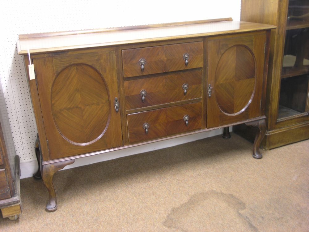 Appraisal: An early th century mahogany sideboard three central drawers flanked