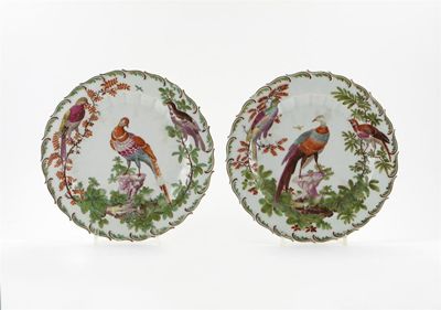 Appraisal: A pair of Chelsea plates with feather moulded rims each