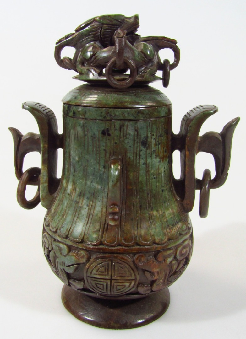 Appraisal: A thC decorative metal censer the pear shaped body with