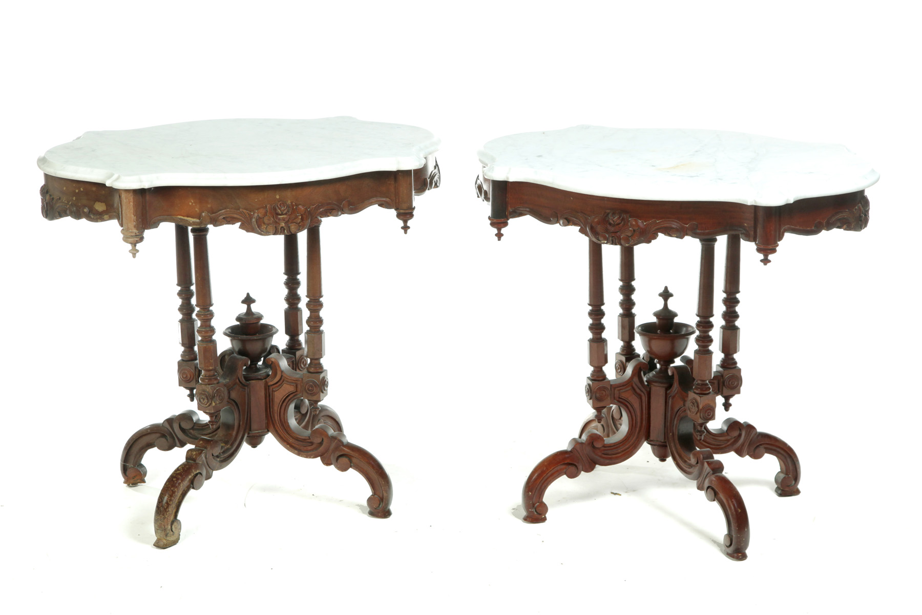 Appraisal: TWO NEARLY IDENTICAL VICTORIAN MARBLE TOP PARLOR STANDS American rd