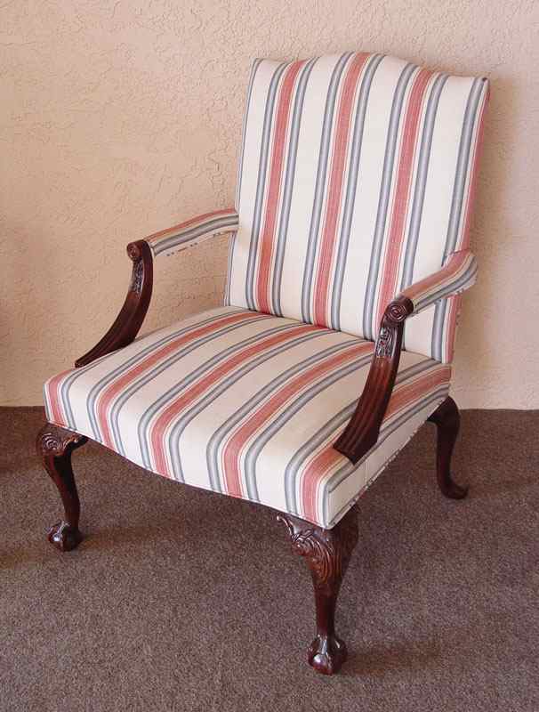 Appraisal: MAHOGANY FRAMED LOLLING CHAIR Front legs ending in ball and