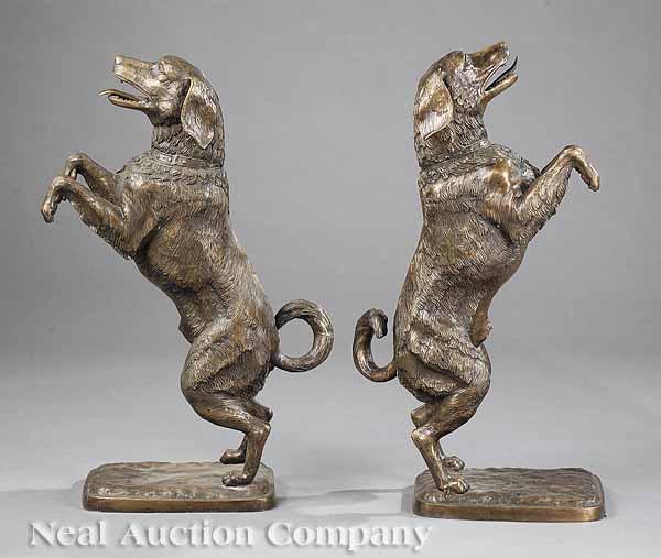 Appraisal: A Pair of Patinated Bronze Dogs th c the male