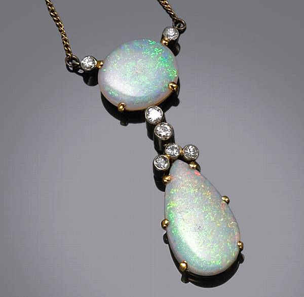 Appraisal: A diamond opal and k bicolor gold pendant with k