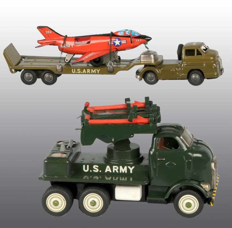 Appraisal: Lot of Tin Army Vehicle Friction Toys Description Japanese Includes