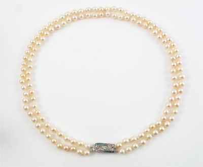 Appraisal: A two row cultured pearl necklace The clasp set with