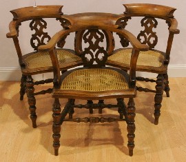 Appraisal: A set of three th century fruitwood and caned captains