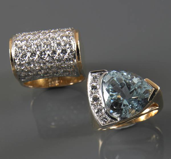 Appraisal: A diamond and k gold ring with one aquamarine and