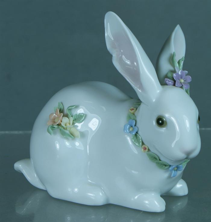 Appraisal: Lladro figurine sitting bunny with flowers has chip to ear