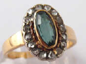 Appraisal: A yellow metal tests carat gold green stone and rose