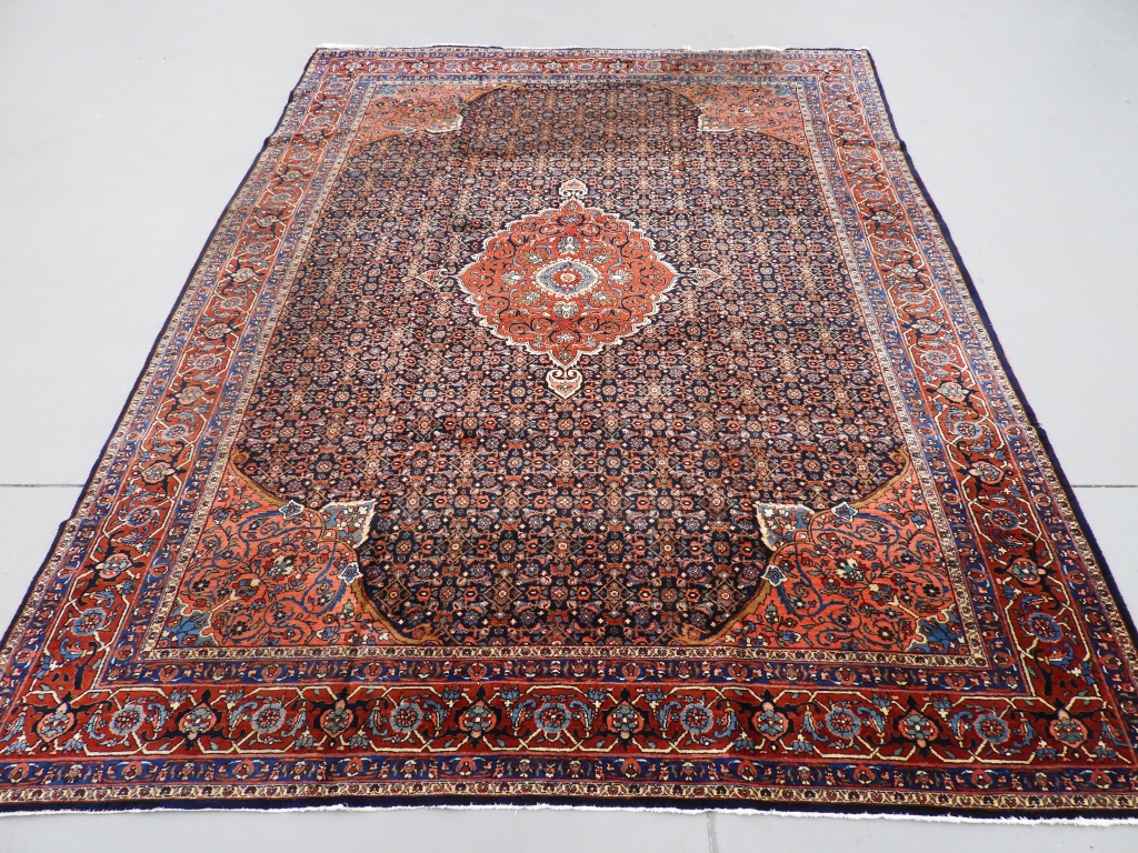 Appraisal: CIRCA ANTIQUE PERSIAN CARPET RUG PersiaCirca Stylized central medallion over