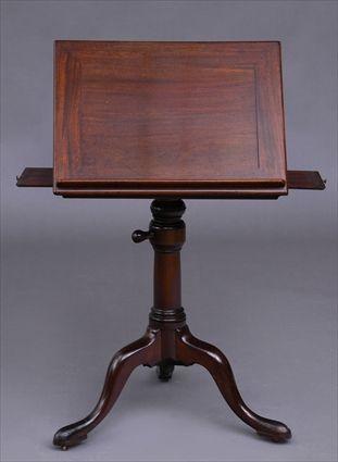 Appraisal: GEORGE III MAHOGANY READING TABLE The adjustable and hinged top