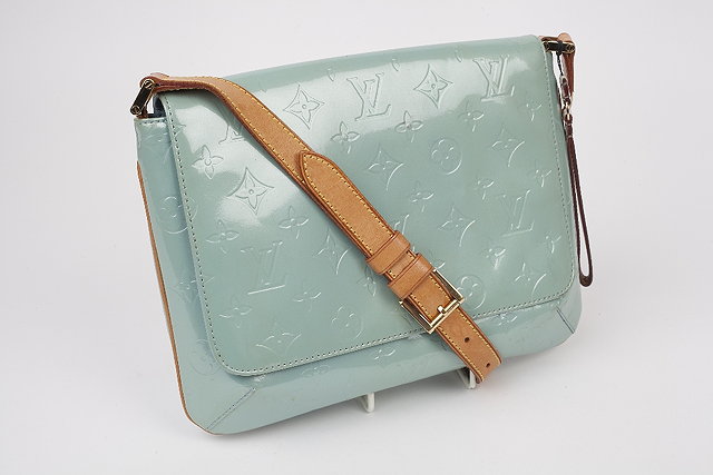 Appraisal: A light blue Louis Vuitton shoulder bag with stamped Louis