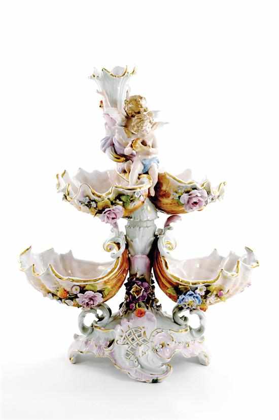 Appraisal: German porcelain centerpiece Rococo stem adorned with floral-encrusted tiers of