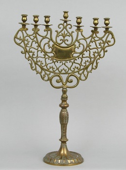 Appraisal: A Cast Brass Candelabra A cast brass ornately formed candelabra