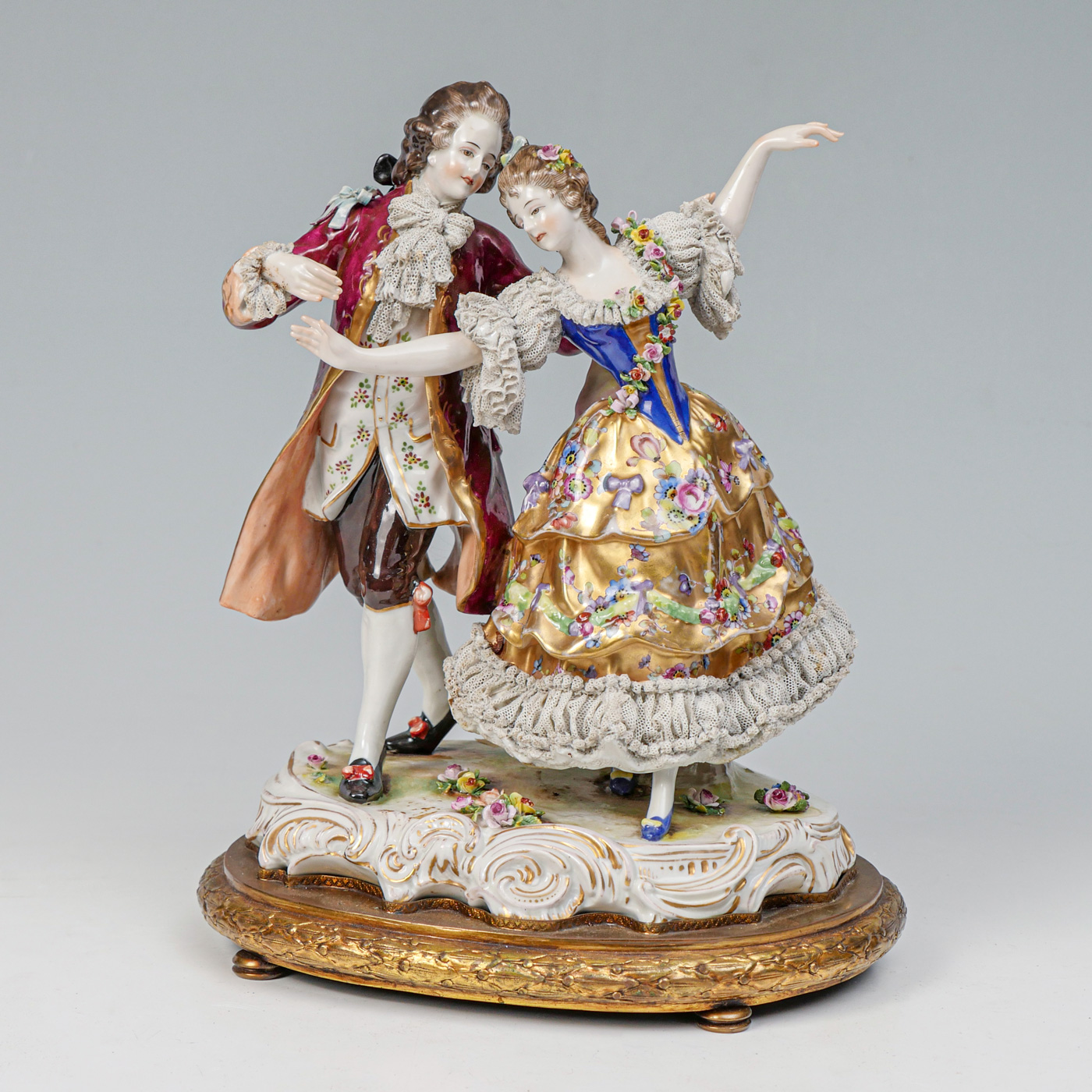 Appraisal: DRESDEN PORCELAIN DANCING COUPLE Male Female dancing porcelain figures having