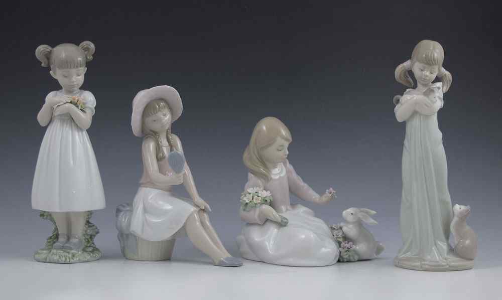 Appraisal: LLADRO PORCELAIN FIGURINES FLOWERS FOR MOMMY Jose Santaeulalia issued ''h