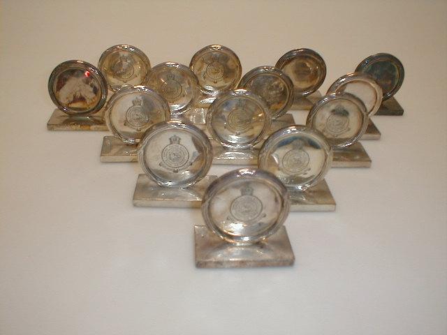 Appraisal: RAF Cranwell a set of electroplated menu holders circular engraved