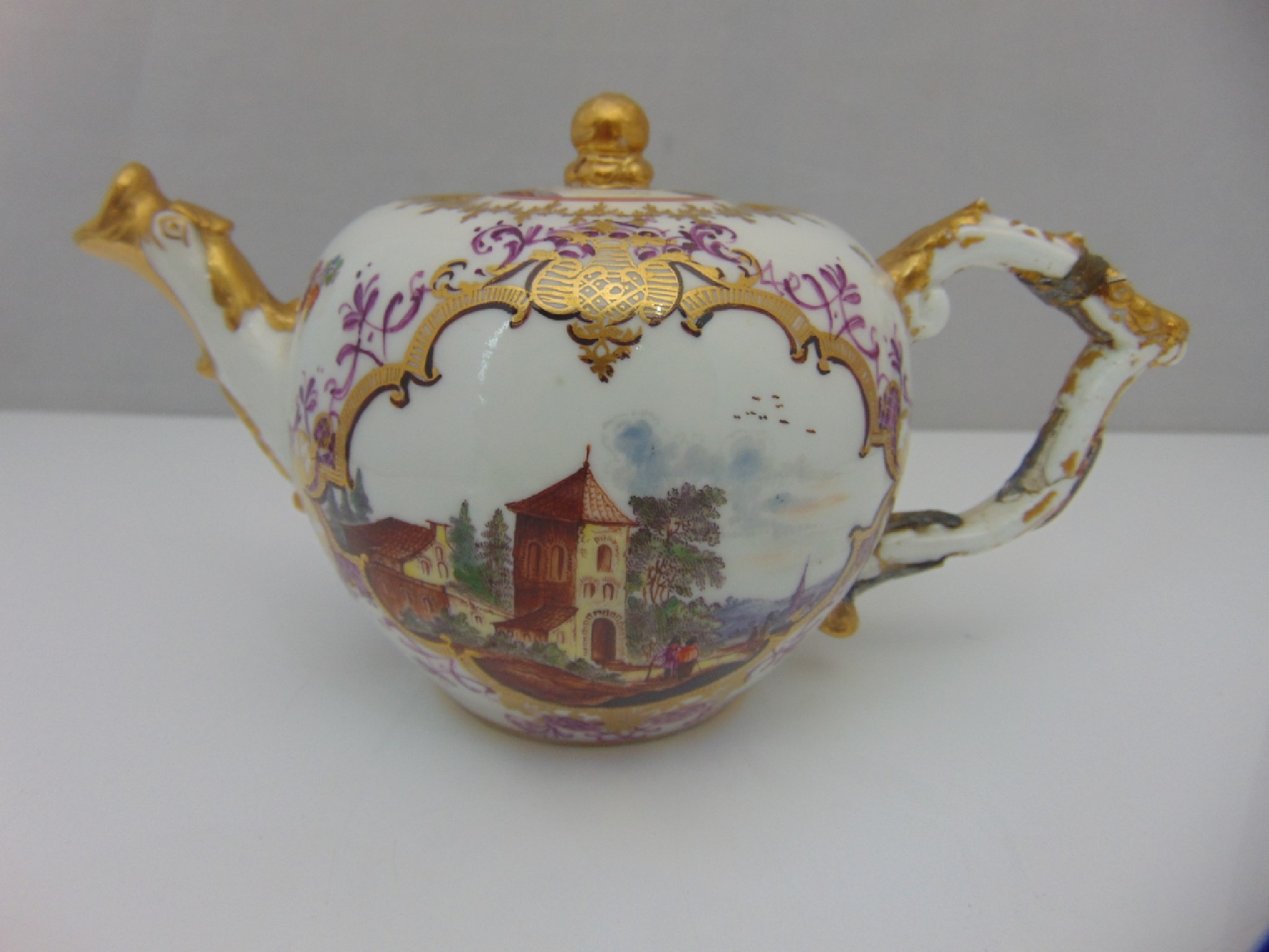 Appraisal: An th century Meissen teapot of globular form with matching