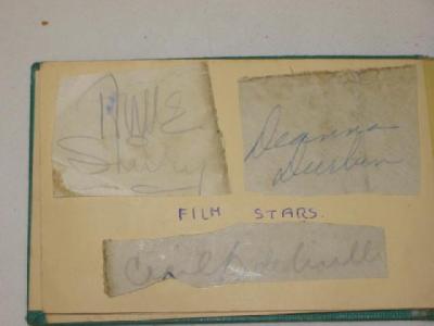 Appraisal: A small album including the pasted-in autographs of Cecil B