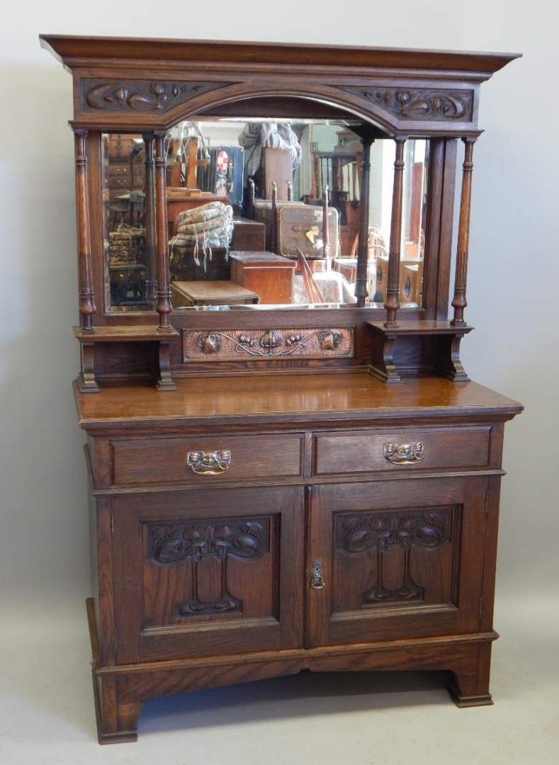 Appraisal: A late thC early thC oak sideboard in Liberty style