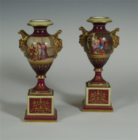 Appraisal: A pair of th century German porcelain twin handled urns