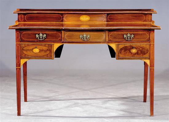 Appraisal: English inlaid mahogany serpentine sideboard mid th century shaped and