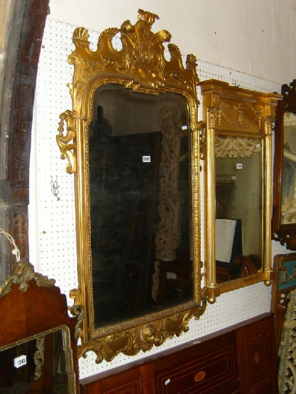 Appraisal: A th century gilded wall mirror the bevel edged plate