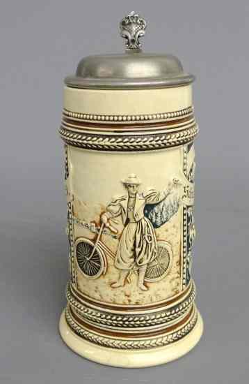 Appraisal: German Stein with female cyclist '' Ht Good cond