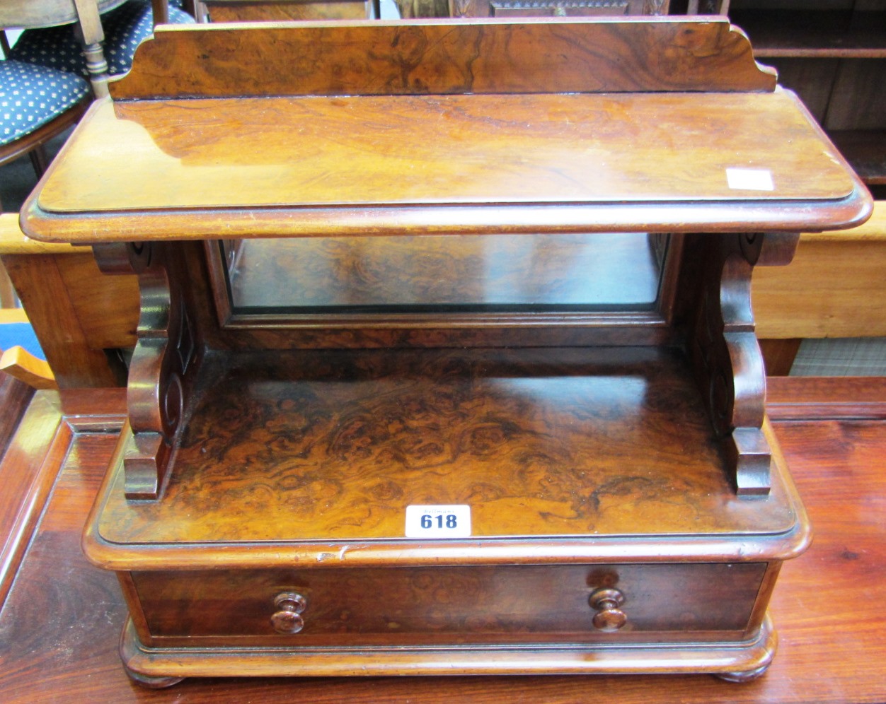 Appraisal: A pair of th century figured walnut table stands with