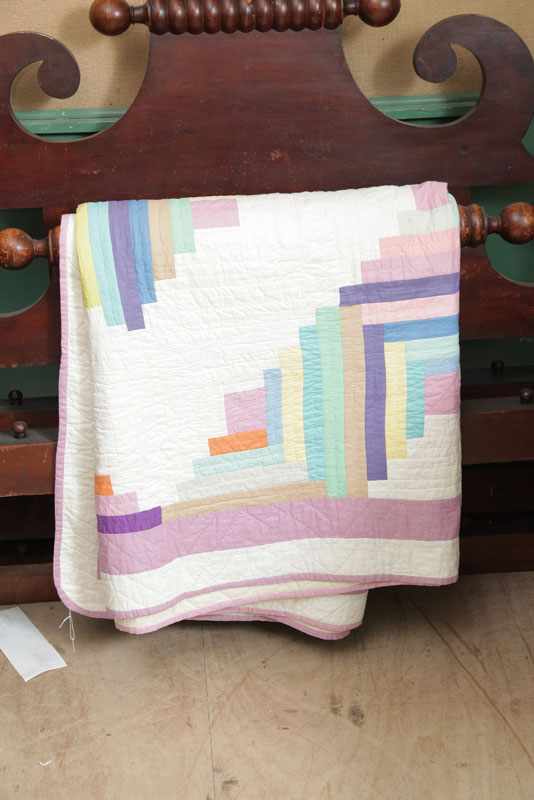 Appraisal: PASTEL APPLIQUED QUILT Polychrome cotton quilt decorated with strips of