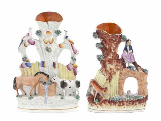 Appraisal: Two Staffordshire Figural Spill Vases the first depicting a maiden