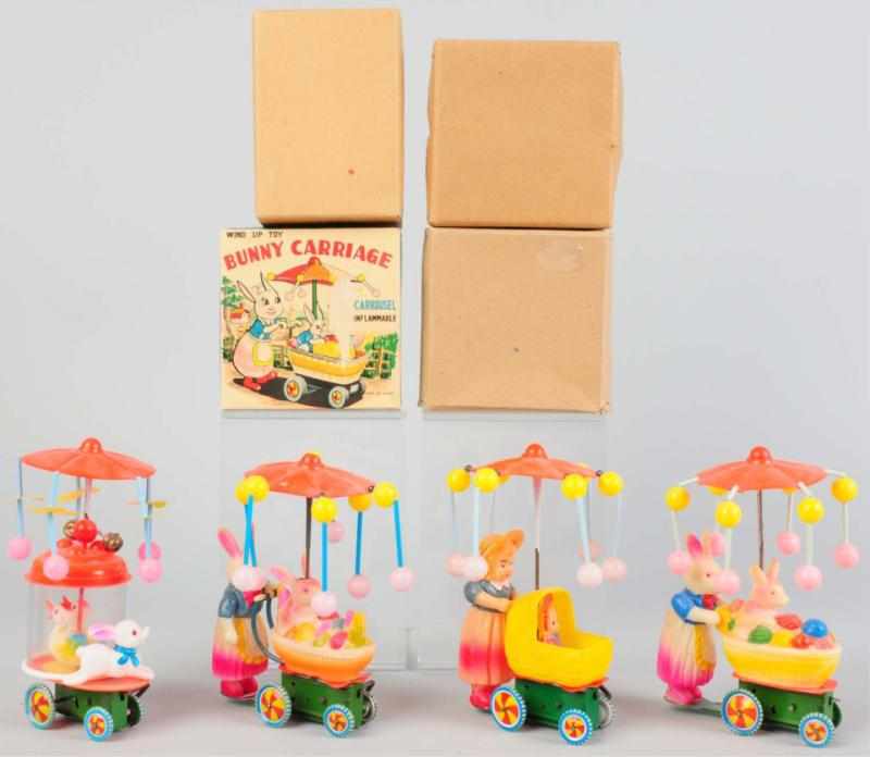 Appraisal: Lot of Celluloid Push Cart Wind-Up Toys Japanese Working Includes