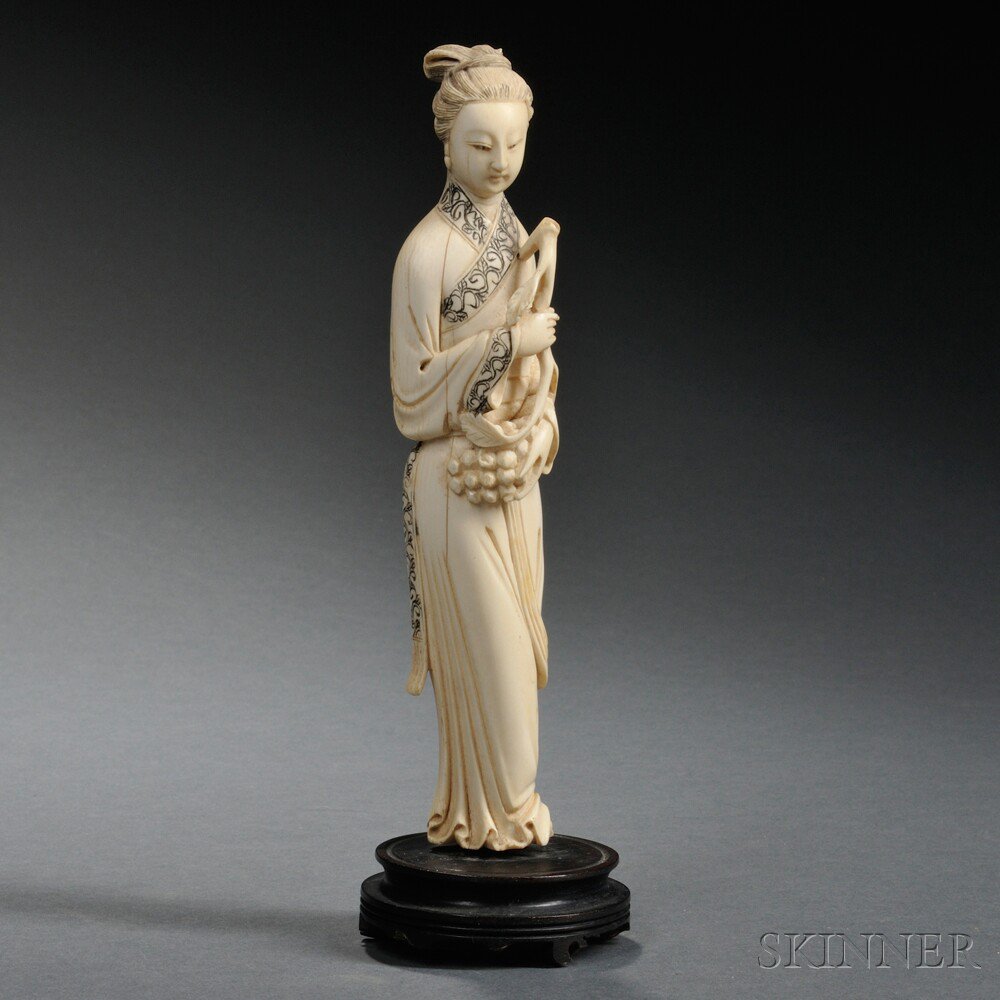 Appraisal: Ivory Woman China th th century depicted standing with a