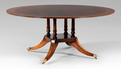 Appraisal: Regency style mahogany dining table banded and figured mahogany veneered