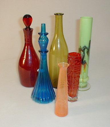 Appraisal: Coloured glass vases bottles and decanters