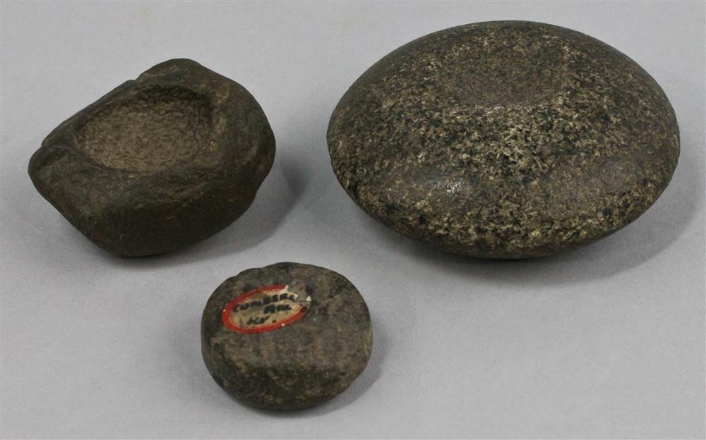 Appraisal: TWO GAME STONES AND A STONE PAINT POT WOODLAND PERIOD