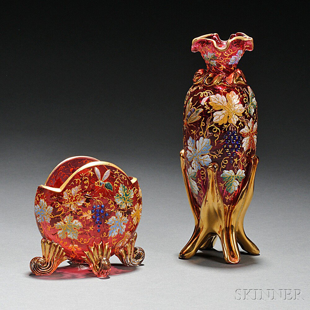 Appraisal: Two Moser-type Gilded and Enameled Cranberry Glass Vases Bohemia late