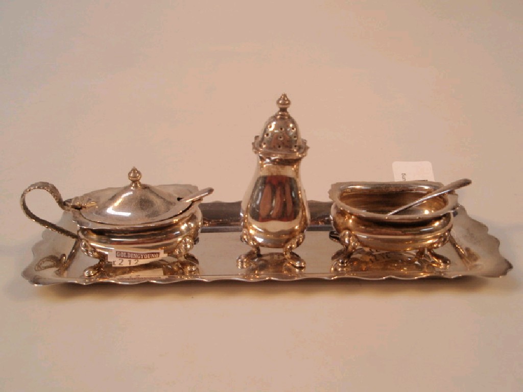 Appraisal: A three piece silver condiment set with tray Birmingham oz