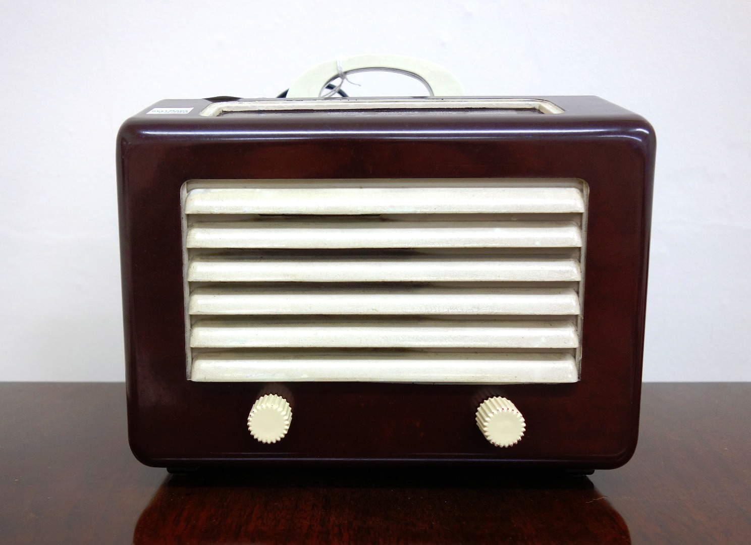 Appraisal: Two Marconi T DA radio in brown bakelite case with