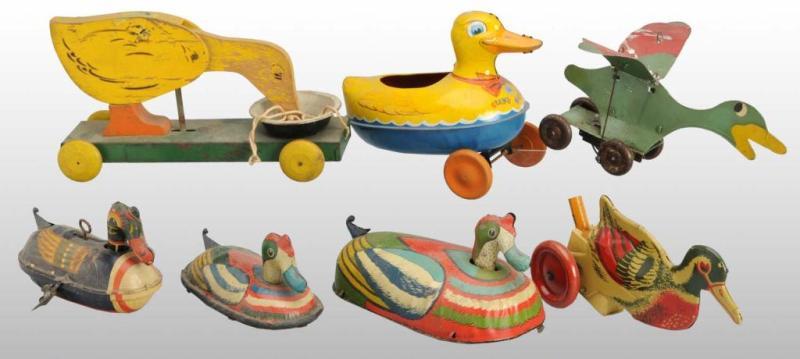 Appraisal: Lot of Tin Wooden Duck Toys Description American and English