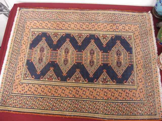 Appraisal: Turkman Persian Hamdmade Mat geometrics red white on indigo field