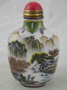 Appraisal: A Chinese ceramic snuff bottle with landscape scenes