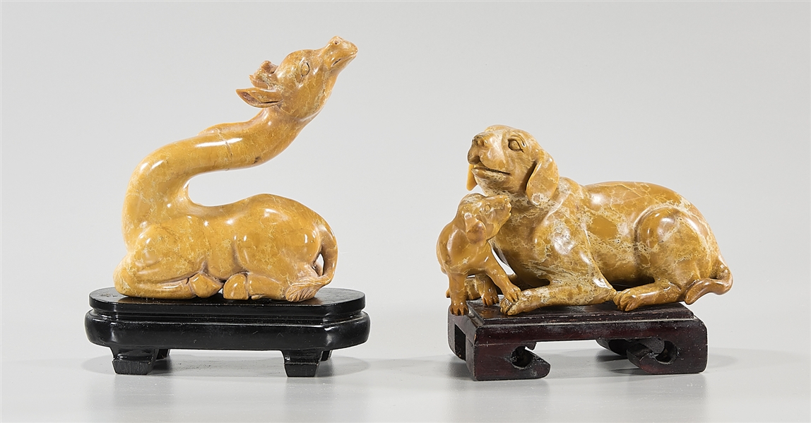 Appraisal: Two Chinese carved stone animals including a camel and dog