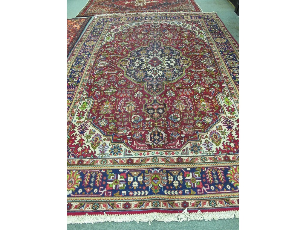 Appraisal: Tabriz multi coloured floor rug