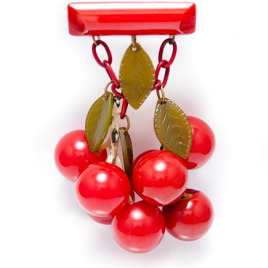 Appraisal: Bakelite and celluloid suspended cherry brooch