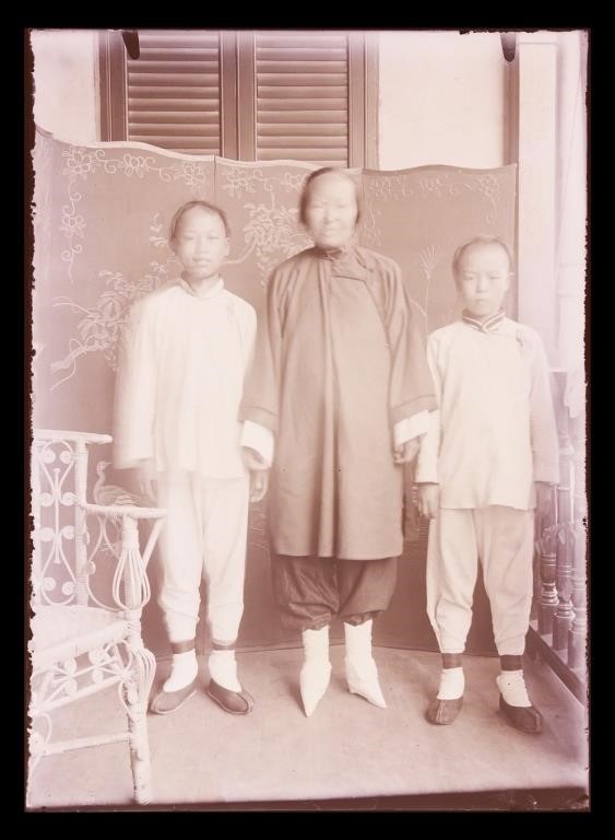 Appraisal: Circa glass negative of Chinese woman with two children Some